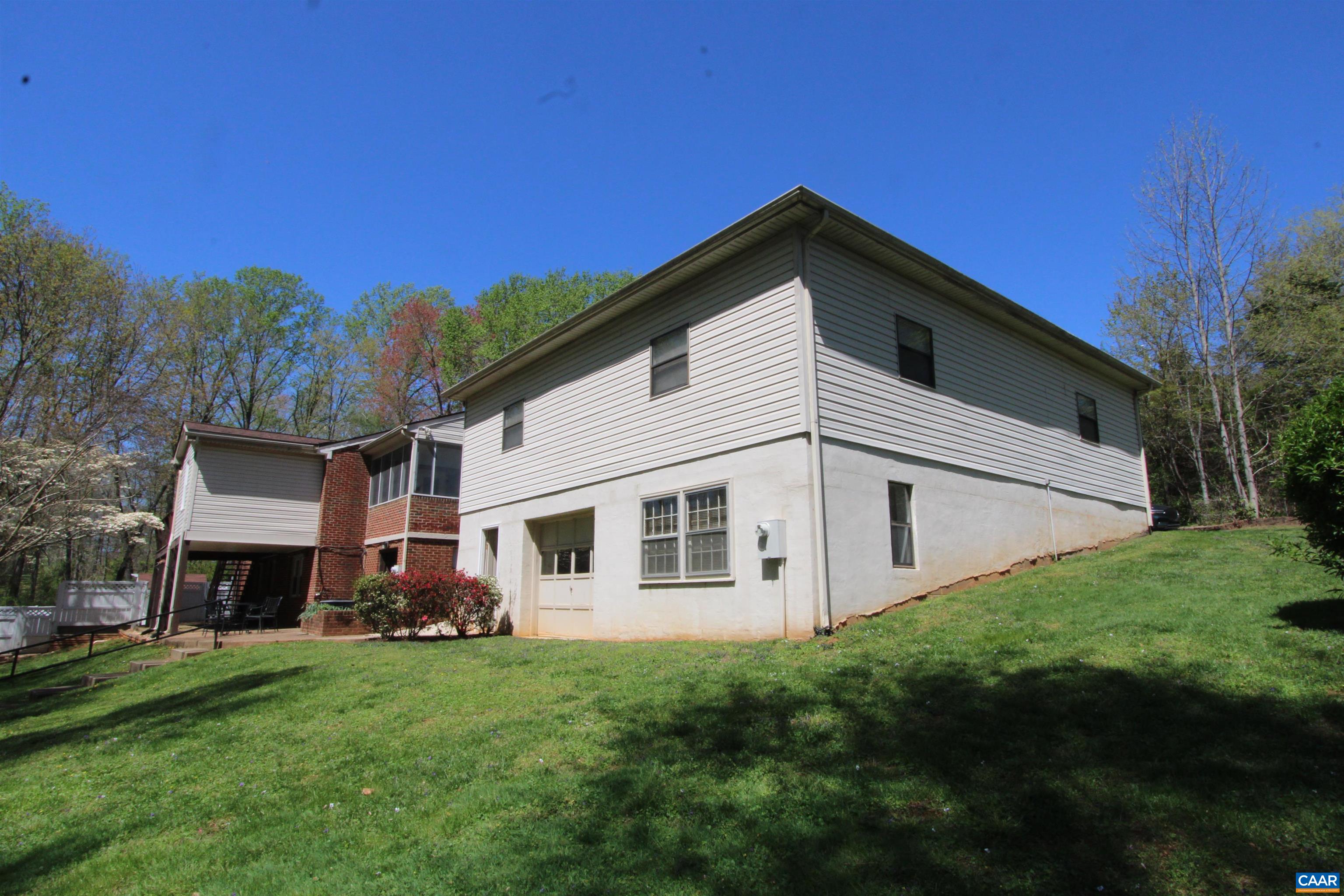 3515 Richmond Road Keswick, VA 22947 - Photo 44 of 47 a view of a house with a yard