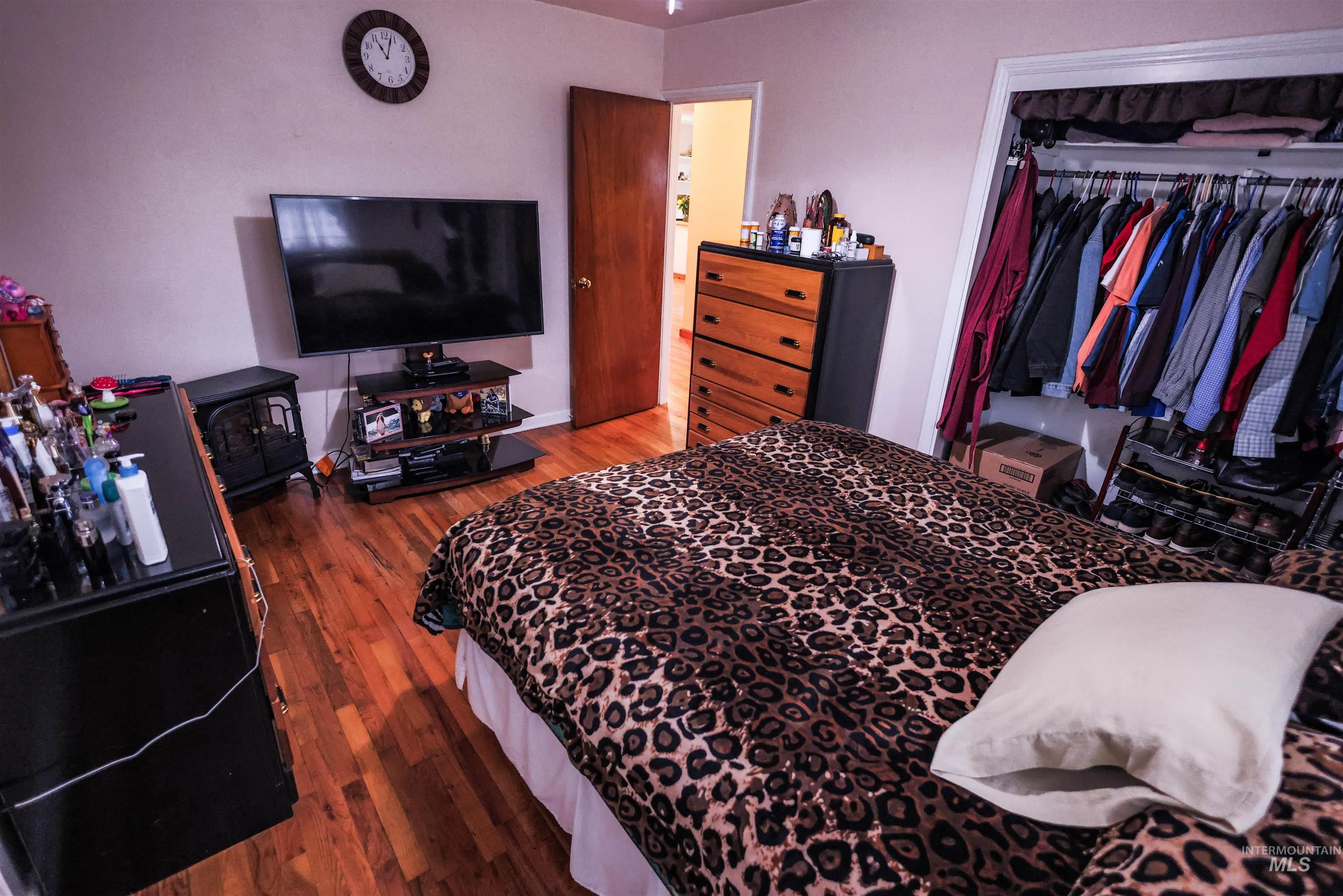 712 Hill Street Kamiah, ID 83536 - Photo 27 of 41 Bedroom featuring dark wood-type flooring and a closet