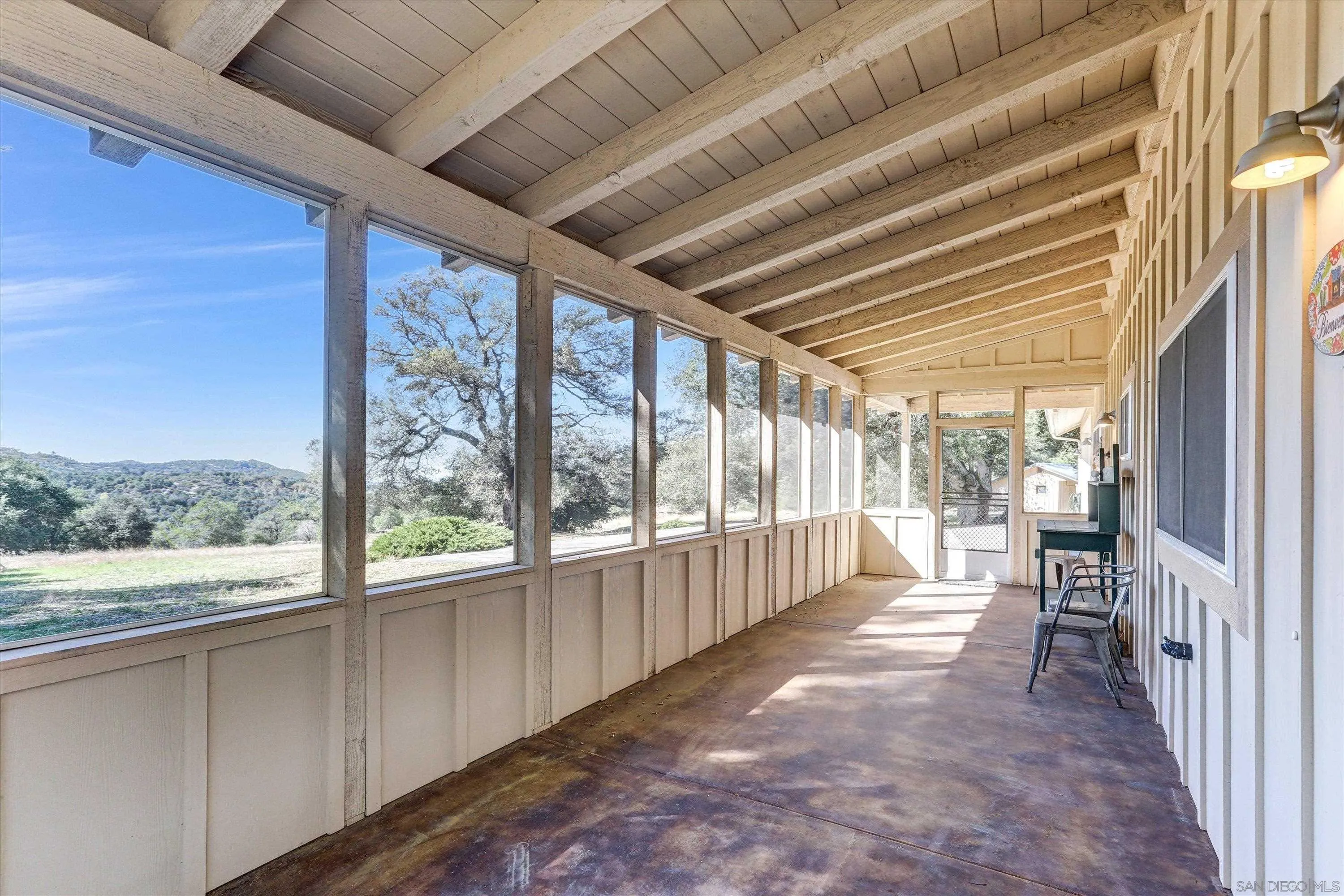 3258 Pine Hills Road Julian, CA 92036 - Photo 19 of 72 a view of a porch with wooden floor and outdoor space