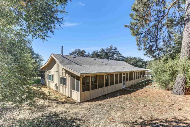 a view of house with outdoor space