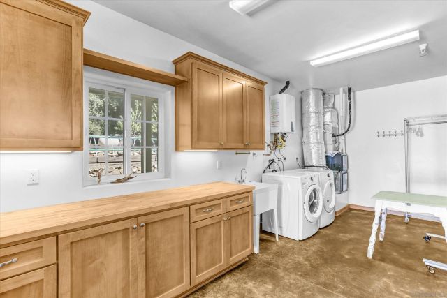 a view of empty room with wooden walls