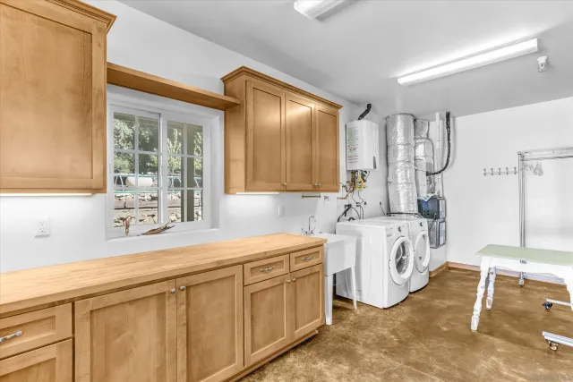 a view of empty room with wooden walls