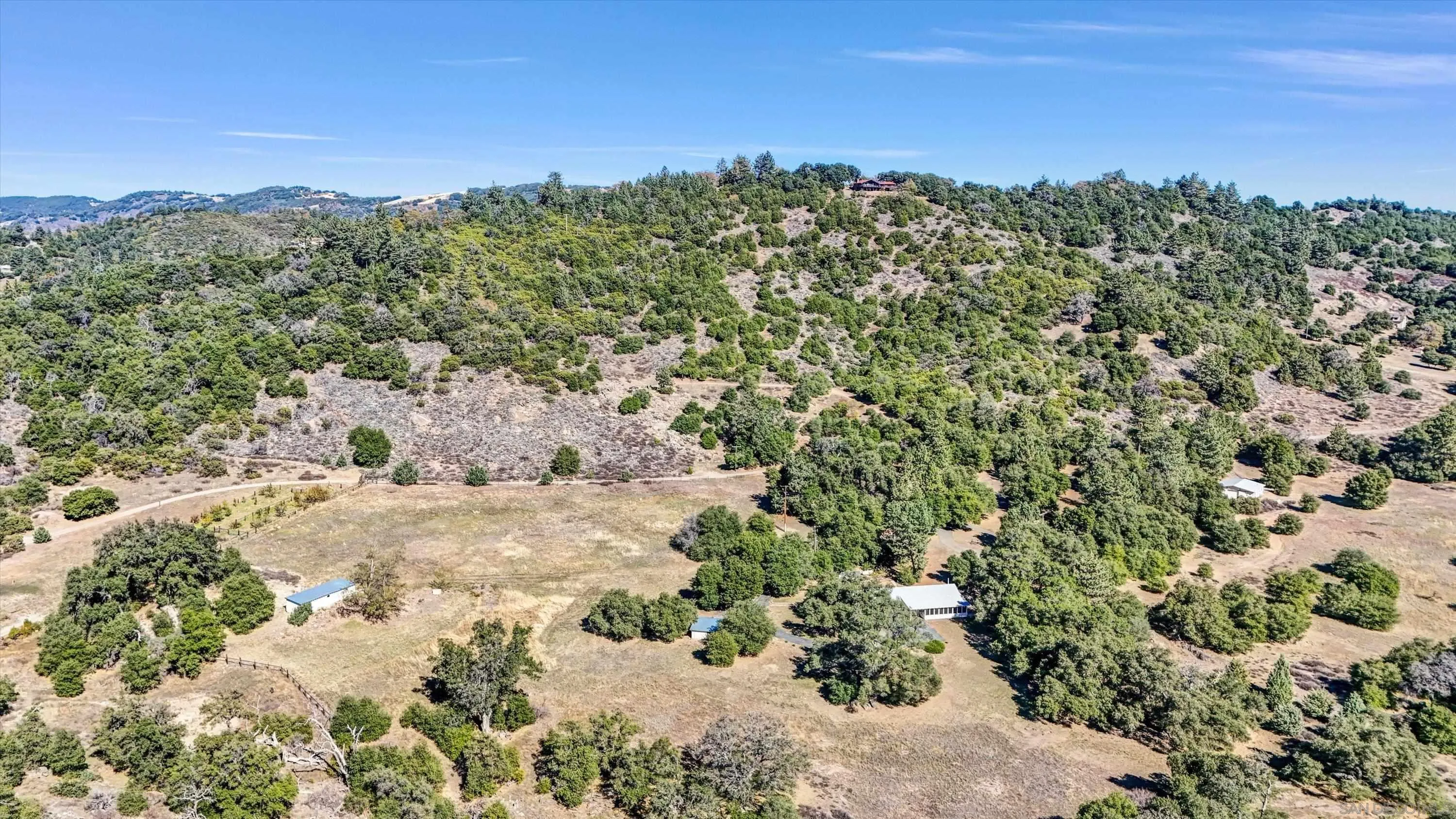 3258 Pine Hills Road Julian, CA 92036 - Photo 61 of 72 a view of a field with a mountain in the background