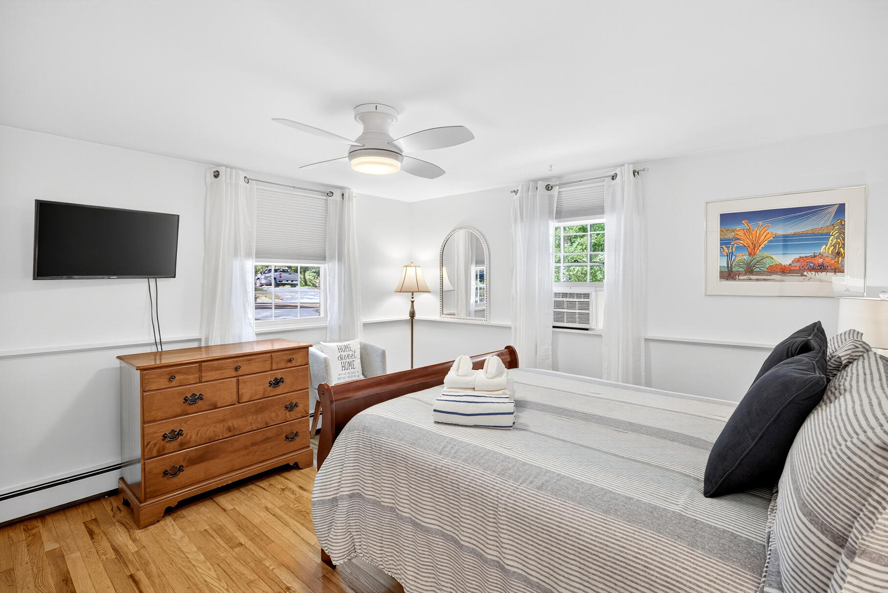 53 Great Oak Road Orleans, MA 02653 - Photo 19 of 53 a bedroom with a bed and a flat screen tv