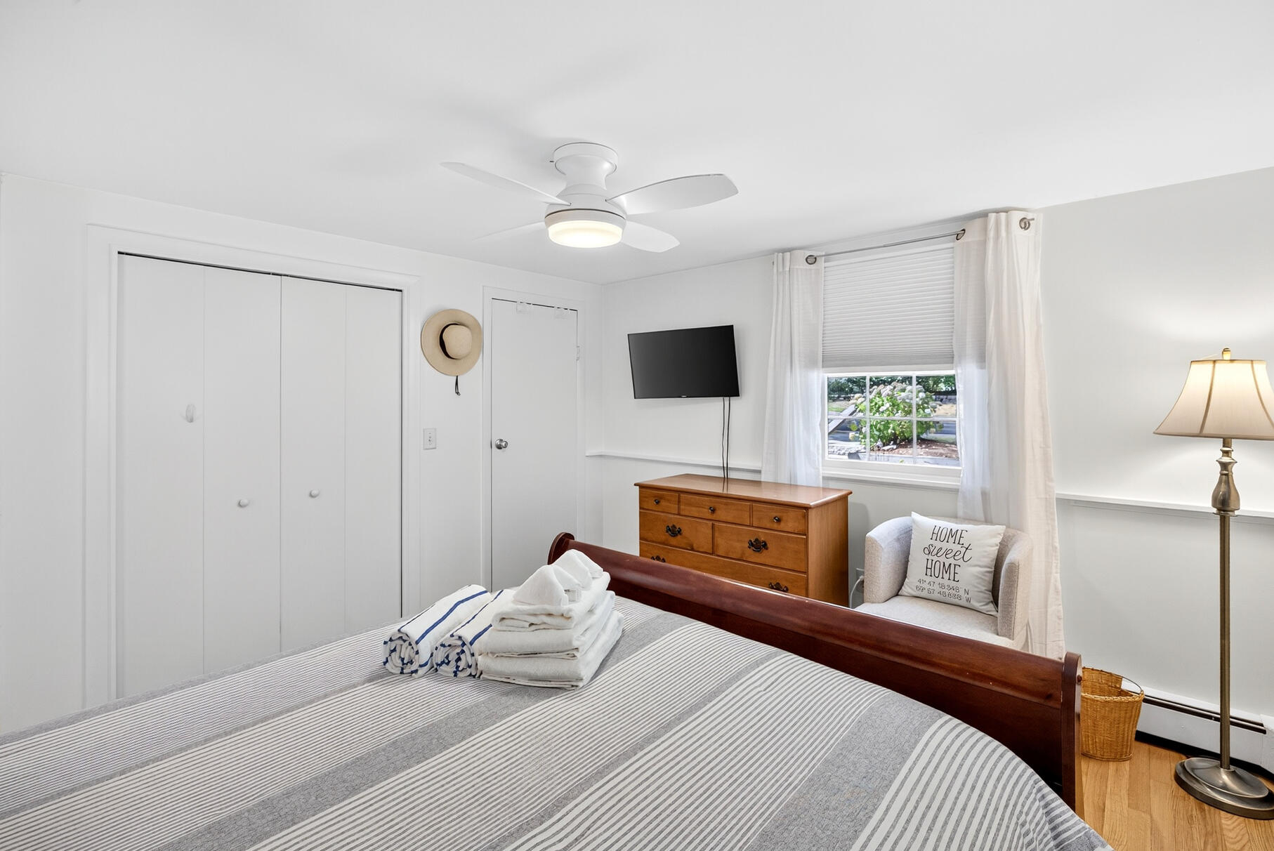 53 Great Oak Road Orleans, MA 02653 - Photo 22 of 53 a bedroom with a bed and a flat screen tv