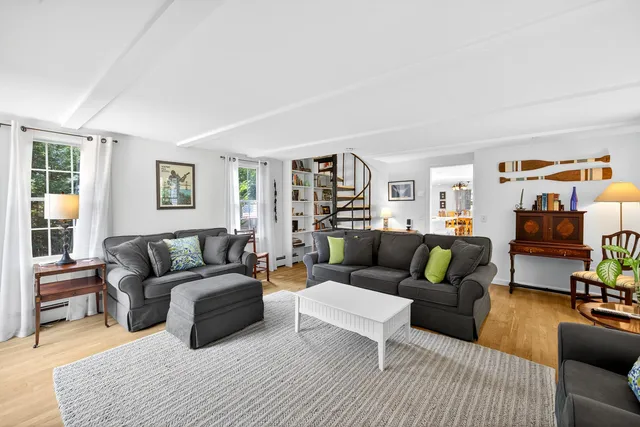 a living room with furniture and a couch