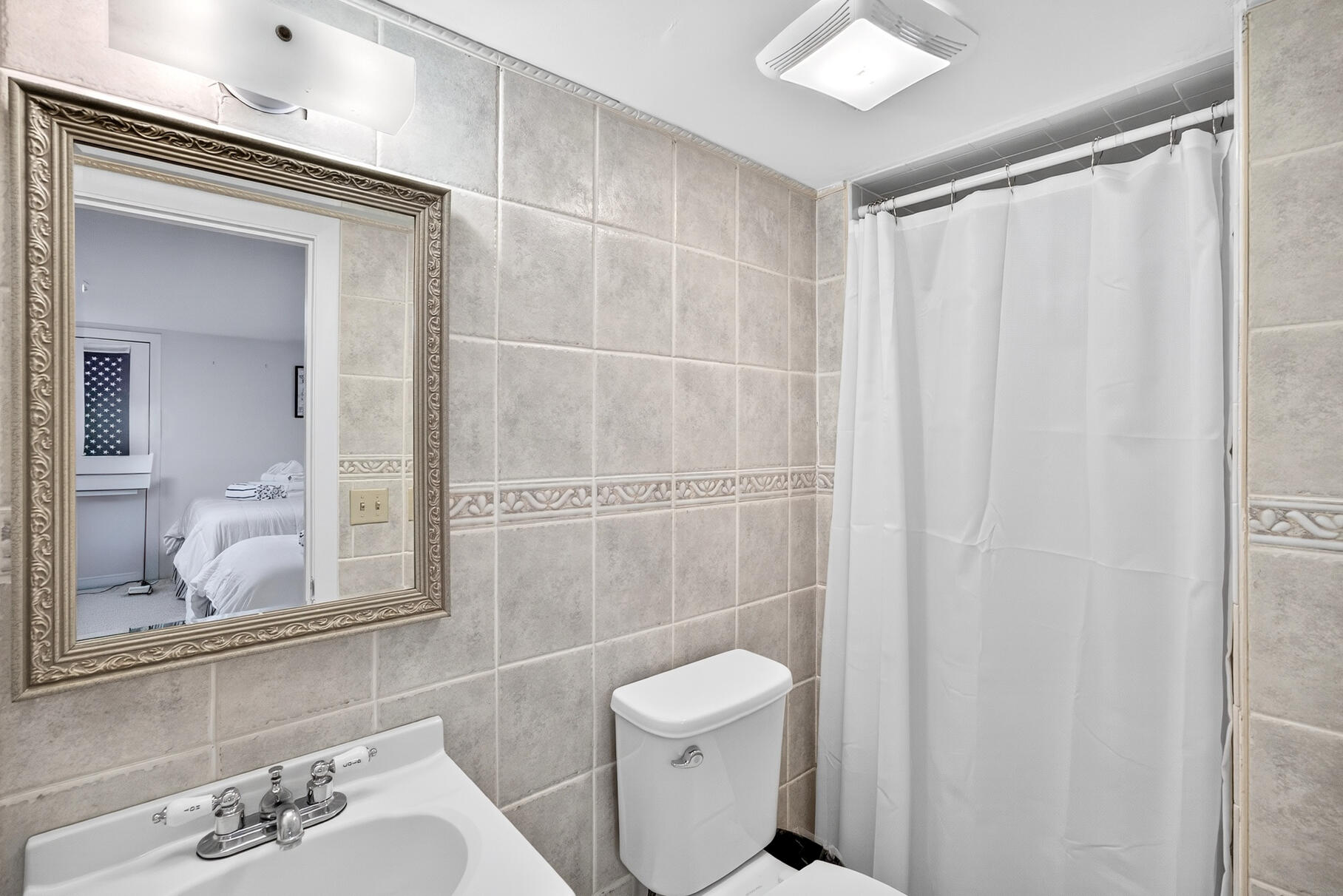 53 Great Oak Road Orleans, MA 02653 - Photo 32 of 53 a bathroom with a sink a toilet and shower