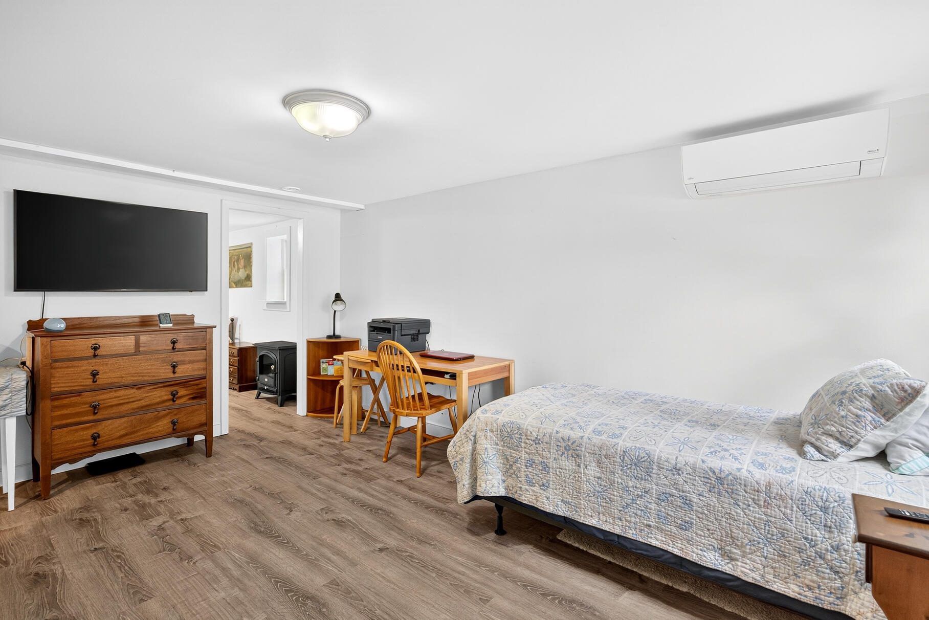 53 Great Oak Road Orleans, MA 02653 - Photo 35 of 53 a bedroom with furniture and a flat screen tv