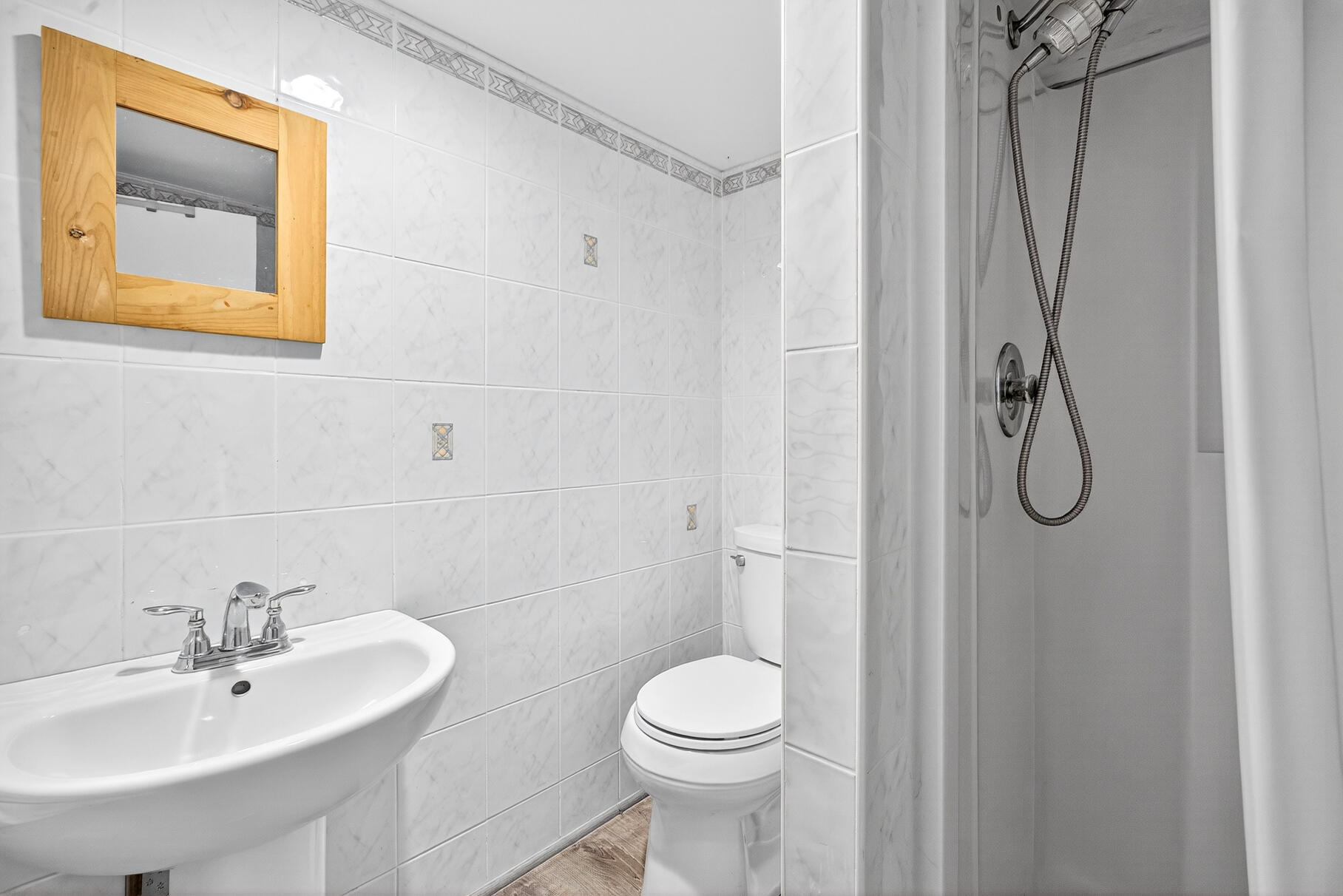 53 Great Oak Road Orleans, MA 02653 - Photo 38 of 53 a bathroom with a sink a toilet and shower