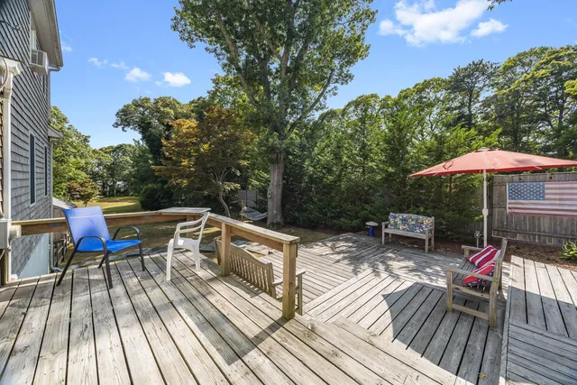a view of roof deck with furniture