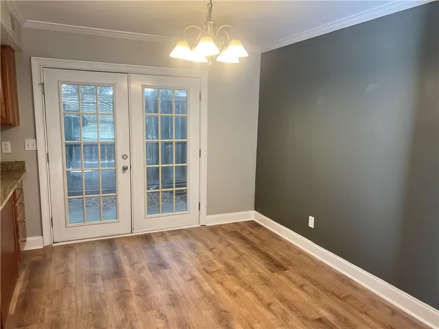 a view of empty room with windows