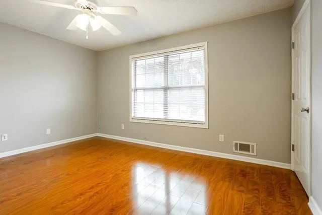a view of a room with a large window