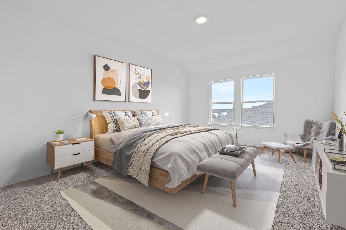 18500 B Empire Path Manor, TX 78653 - Photo 8 of 31 Bedroom with carpet floors and lofted ceiling