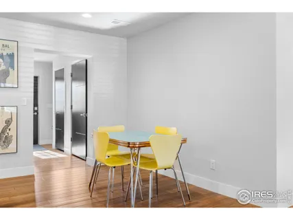 a view of dining room and wooden floor
