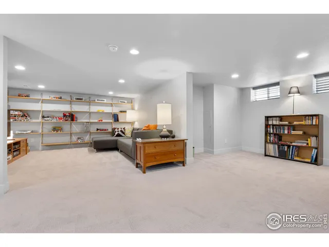 a room with furniture and a flat screen tv