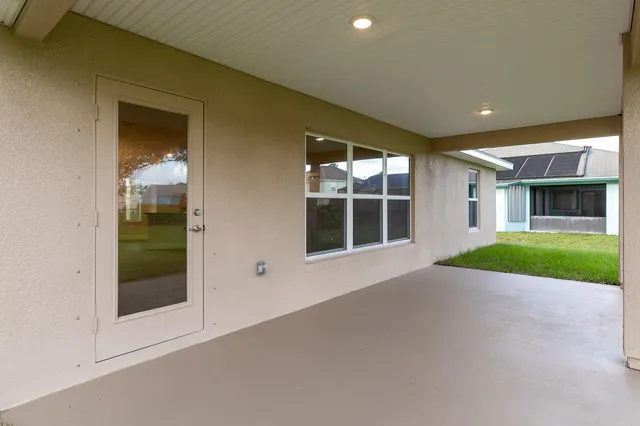 a view of storage and utility room with empty racks