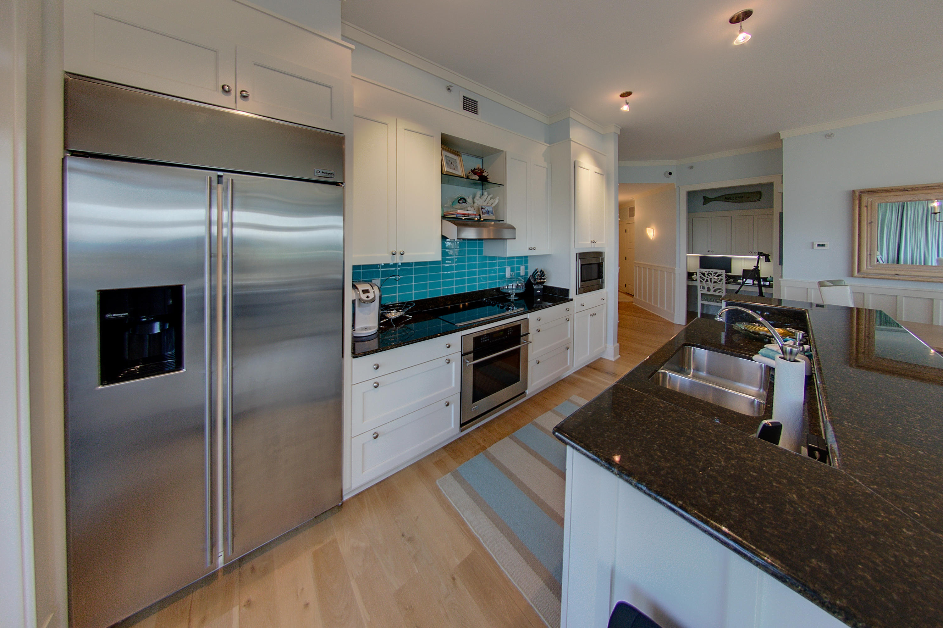 99 Compass Point Way Inlet Beach, Unit 308 Inlet Beach, FL 32461 - Photo 16 of 55 a kitchen with a refrigerator and a sink