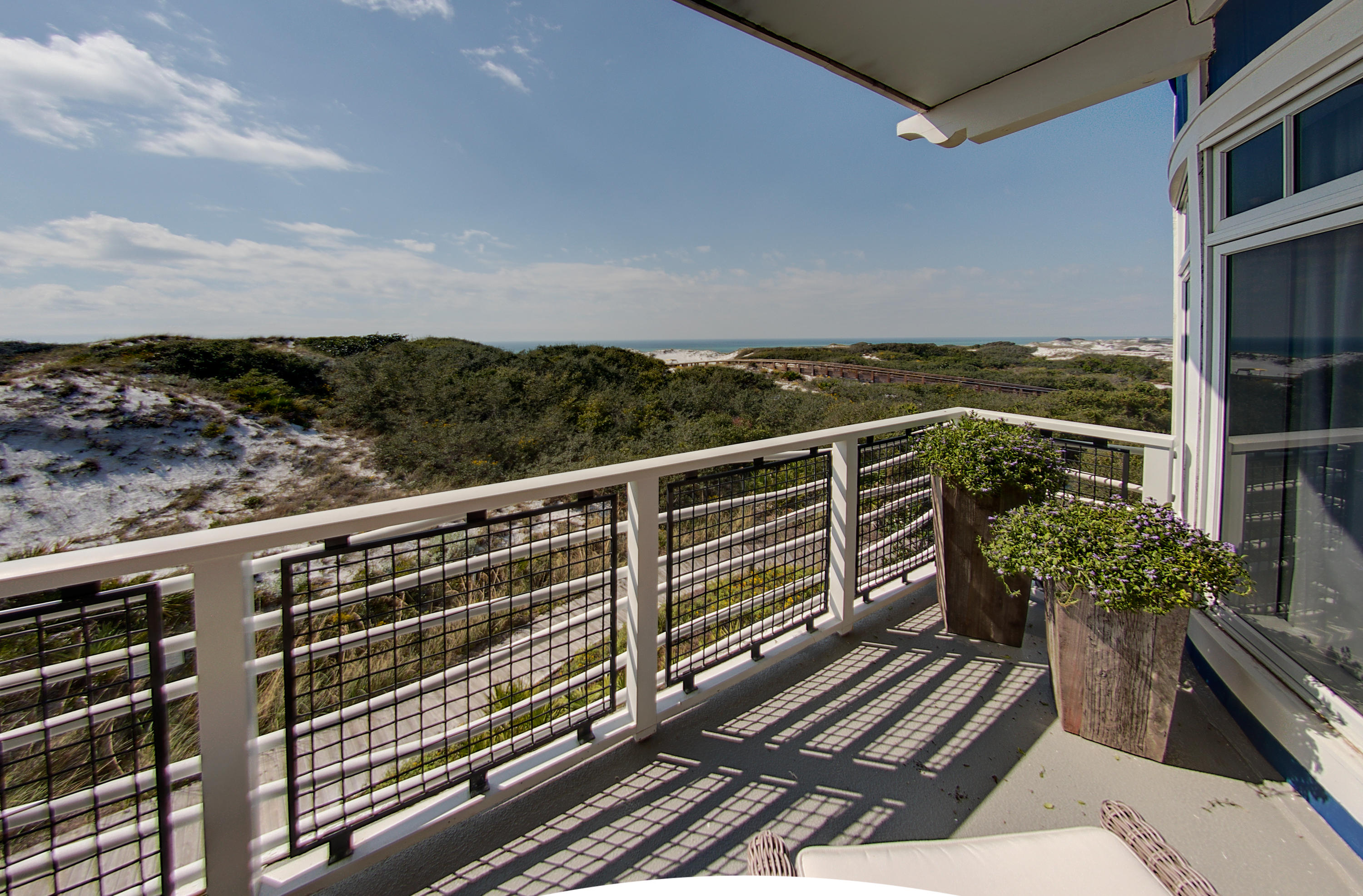 99 Compass Point Way Inlet Beach, Unit 308 Inlet Beach, FL 32461 - Photo 22 of 55 a view of a balcony with wooden floor