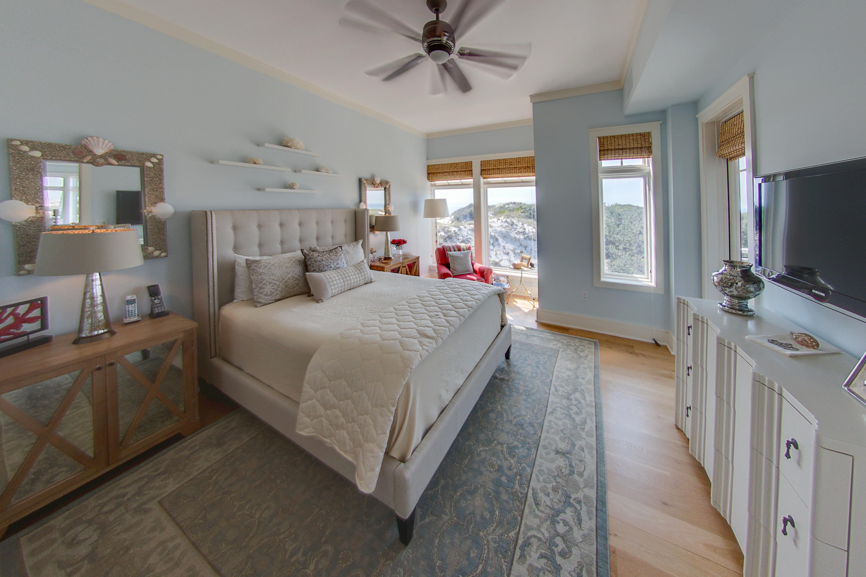 99 Compass Point Way Inlet Beach, Unit 308 Inlet Beach, FL 32461 - Photo 26 of 55 a spacious bedroom with a bed and a flat tv screen on dresser