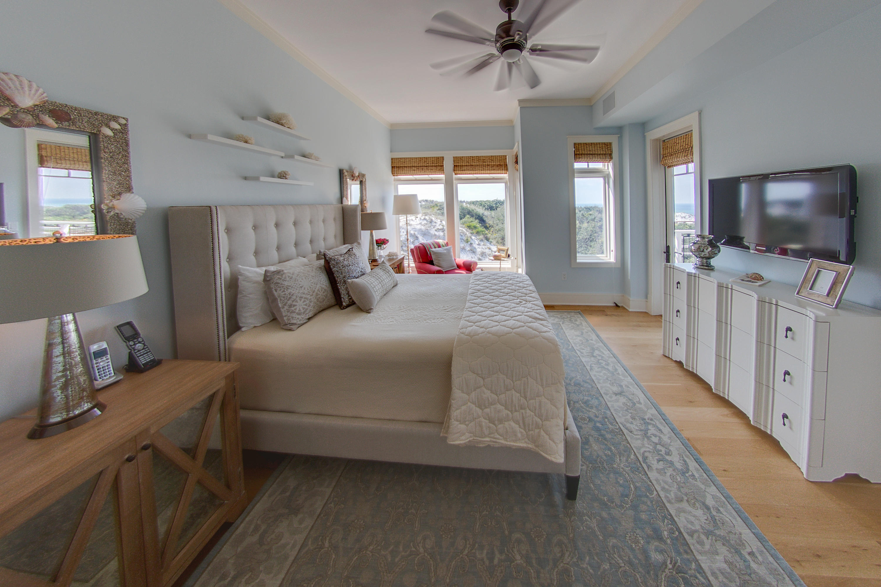99 Compass Point Way Inlet Beach, Unit 308 Inlet Beach, FL 32461 - Photo 27 of 55 a bedroom with a bed and a flat screen tv
