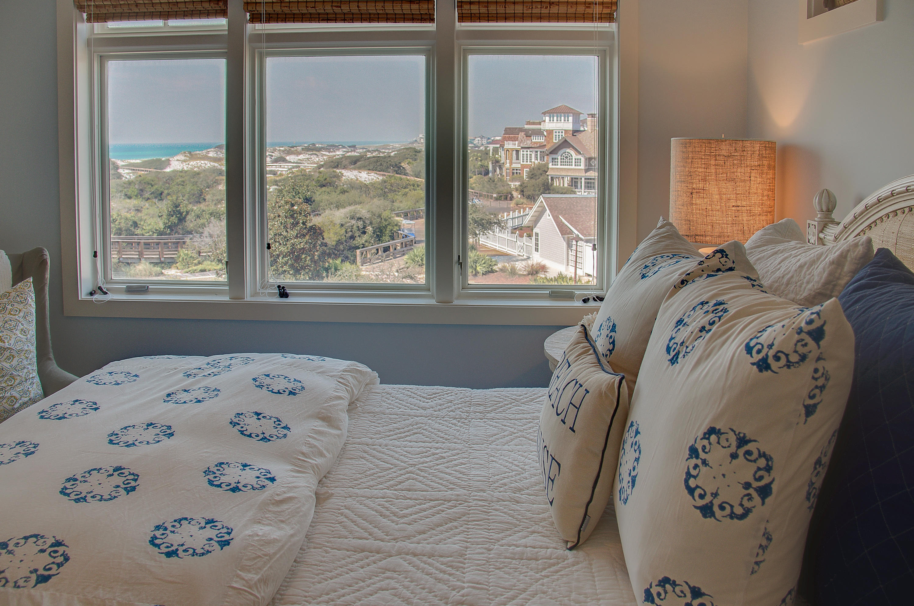 99 Compass Point Way Inlet Beach, Unit 308 Inlet Beach, FL 32461 - Photo 38 of 55 a bedroom with a large bed and a window