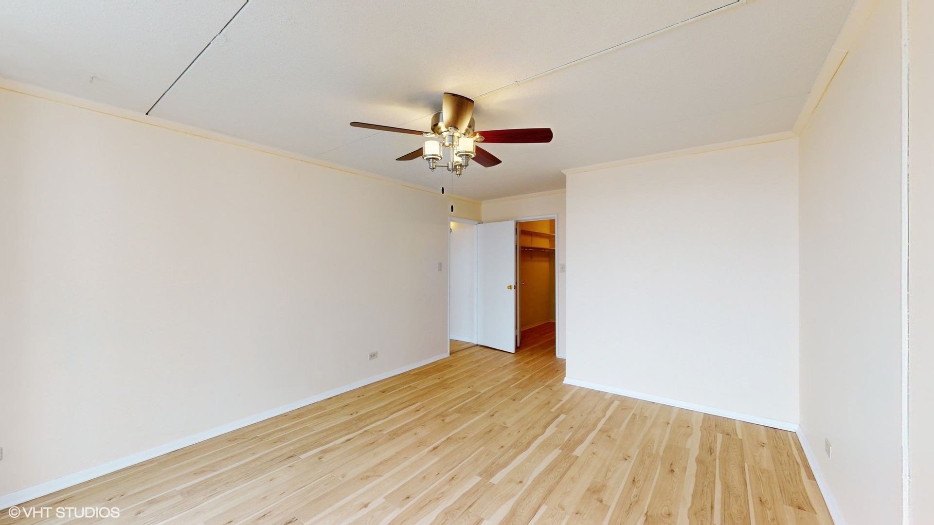 2005 South Finley Road, Unit 805 Lombard, IL 60148 - Photo 17 of 34 a view of empty room with wooden floor