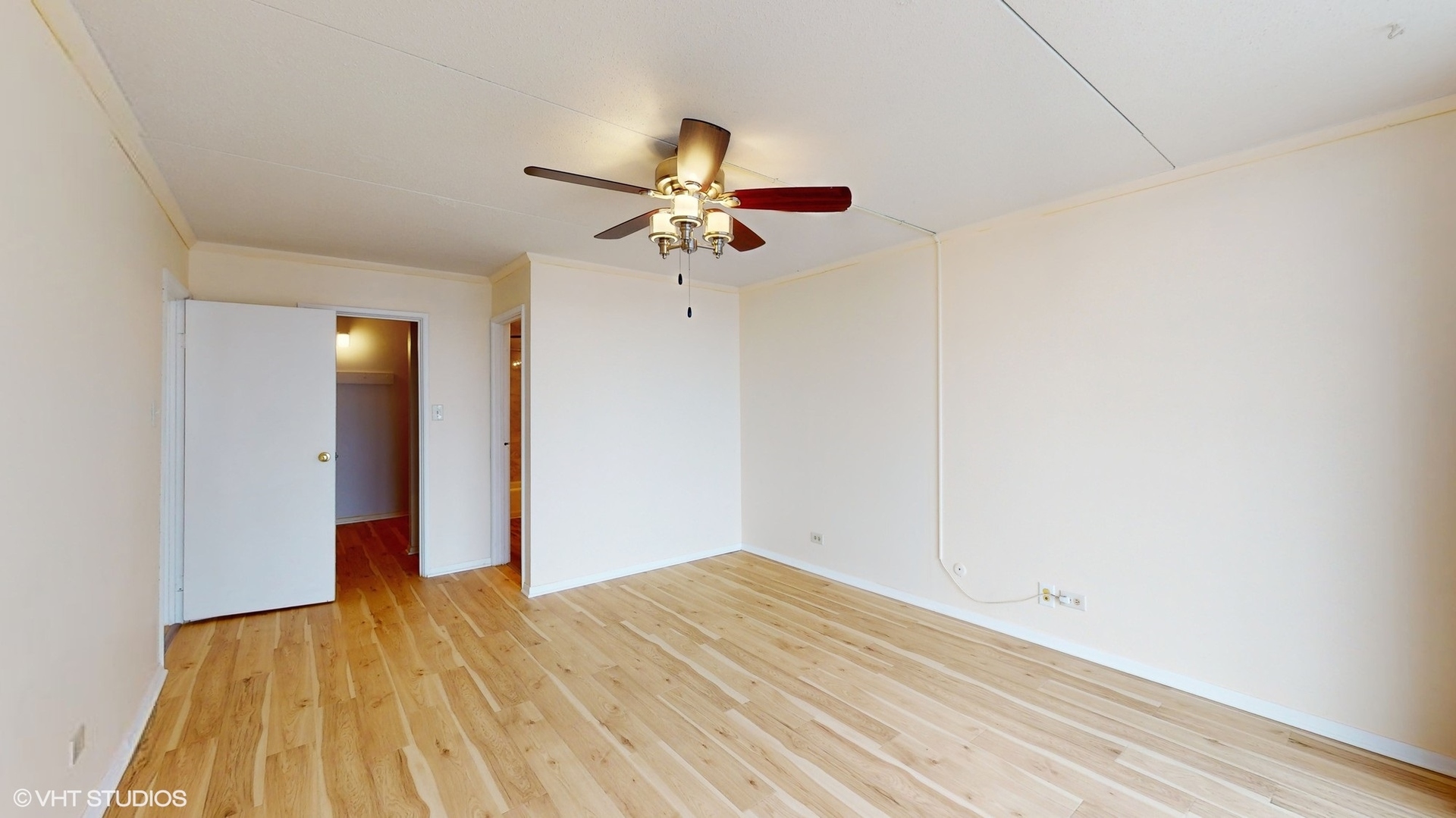 2005 South Finley Road, Unit 805 Lombard, IL 60148 - Photo 18 of 34 a view of empty room with wooden floor