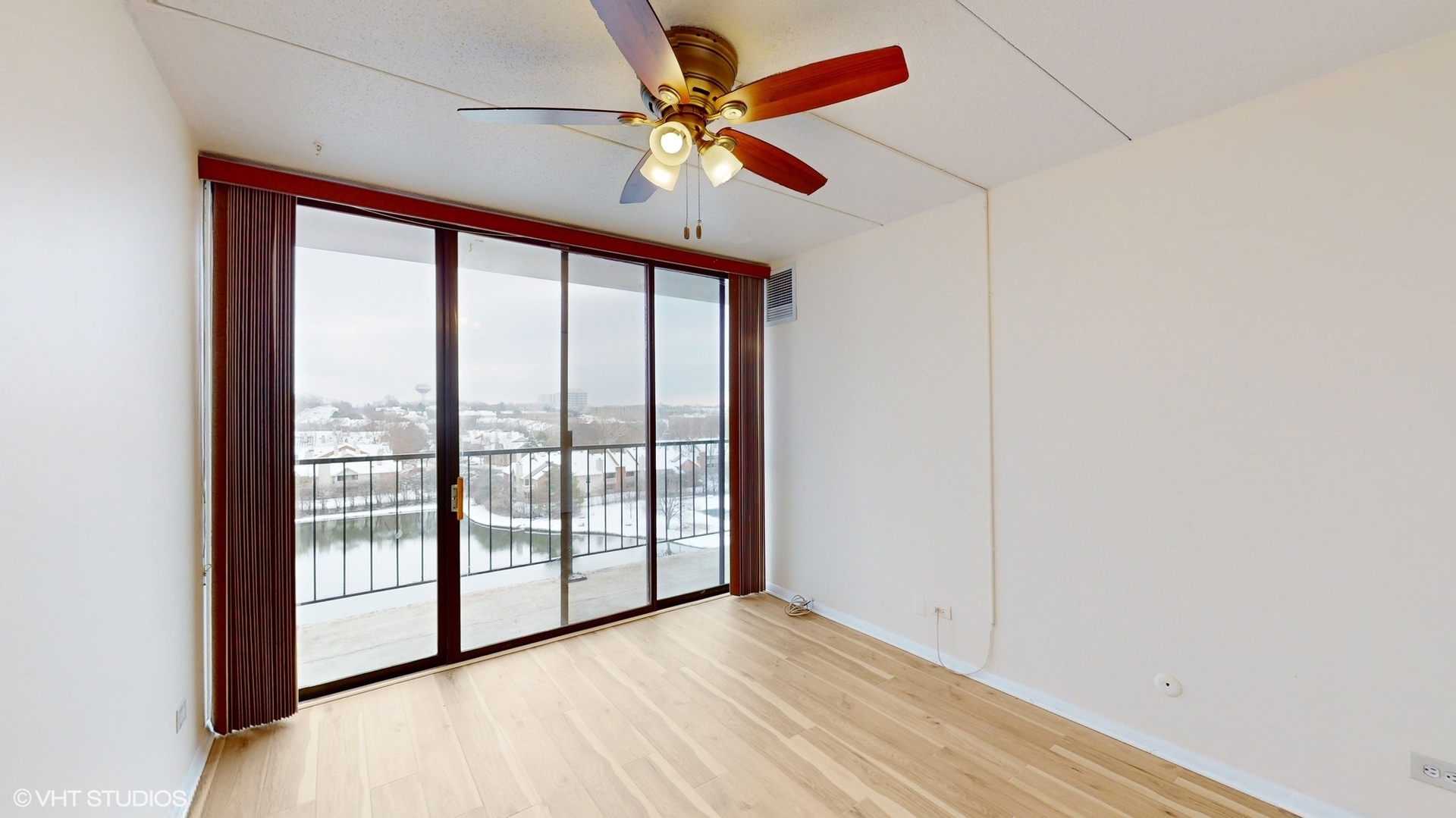 2005 South Finley Road, Unit 805 Lombard, IL 60148 - Photo 22 of 34 wooden floor in an empty room with a window