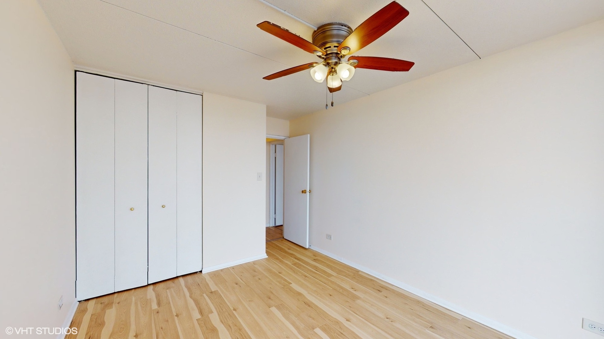 2005 South Finley Road, Unit 805 Lombard, IL 60148 - Photo 24 of 34 a view of a big room with wooden floor