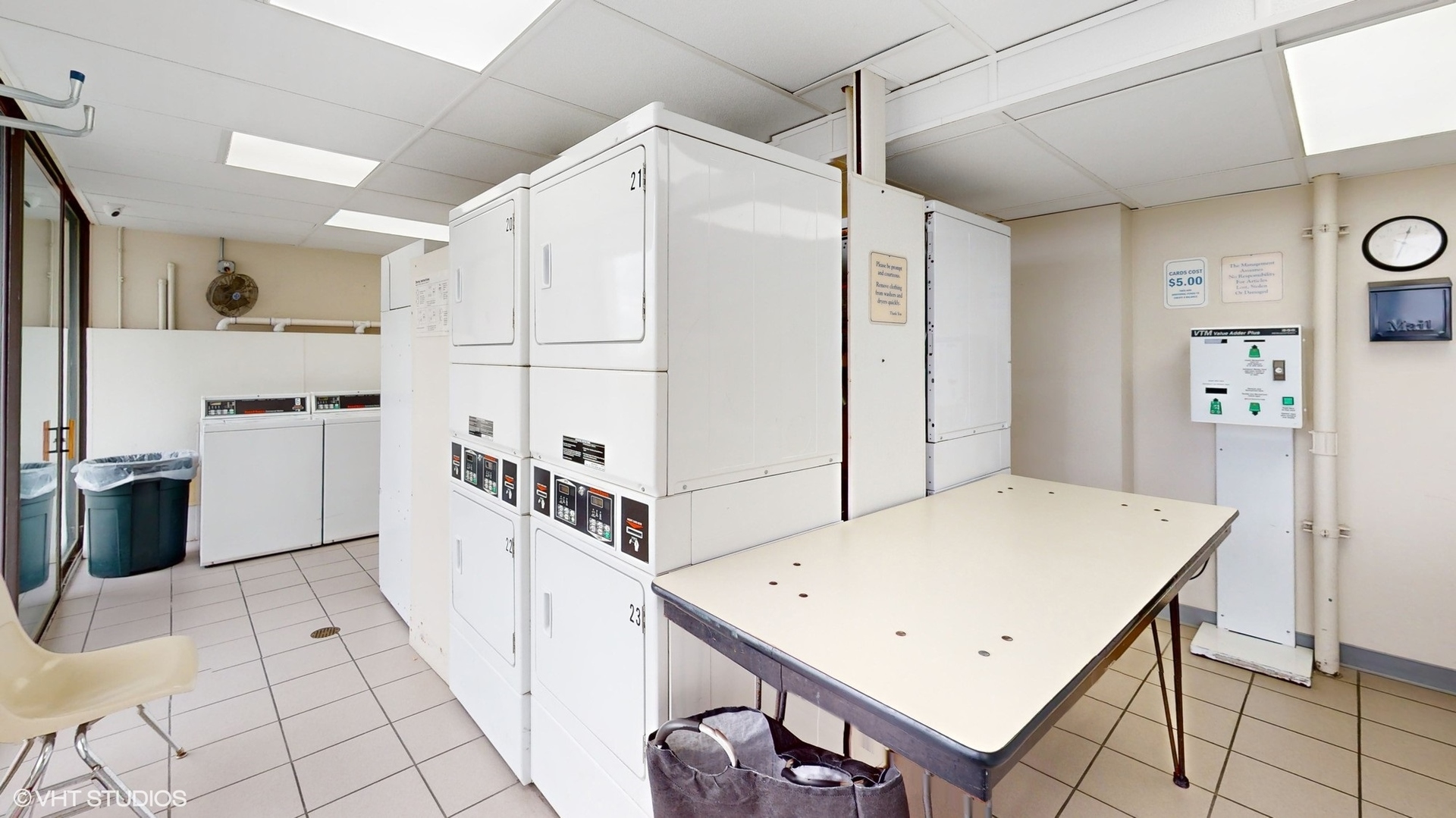 2005 South Finley Road, Unit 805 Lombard, IL 60148 - Photo 29 of 34 a view of kitchen with refrigerator stove and white cabinets