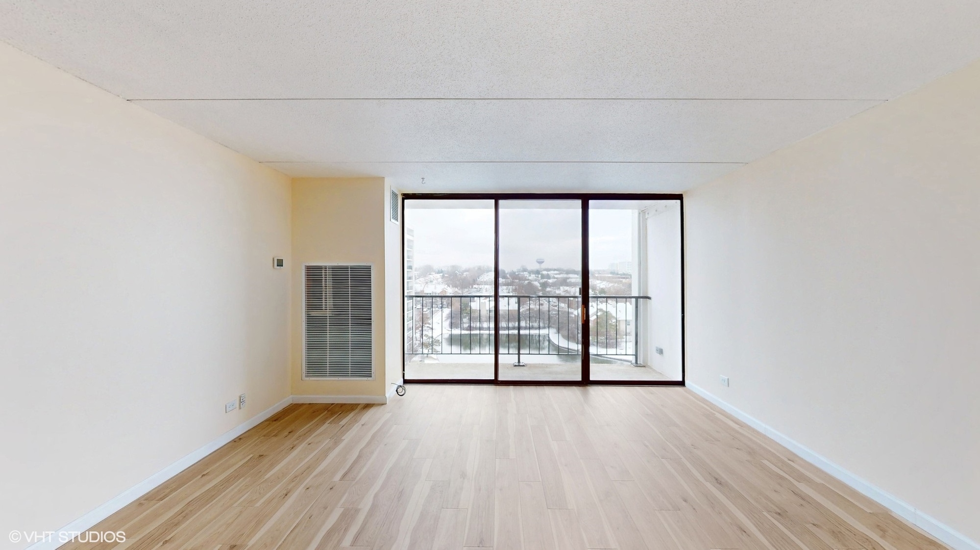 2005 South Finley Road, Unit 805 Lombard, IL 60148 - Photo 3 of 34 wooden floor in an empty room with a window