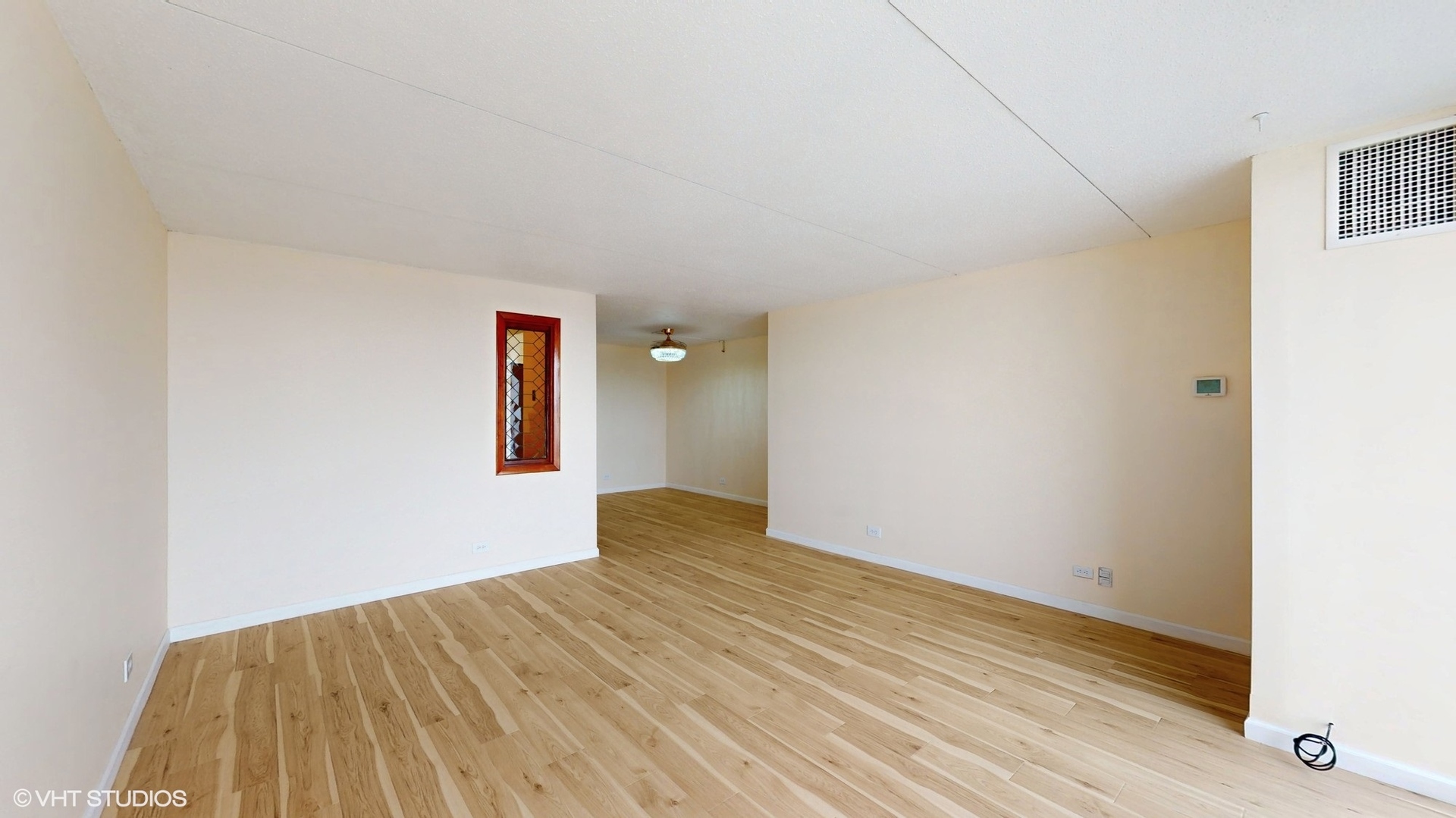 2005 South Finley Road, Unit 805 Lombard, IL 60148 - Photo 5 of 34 a view of an empty room and window