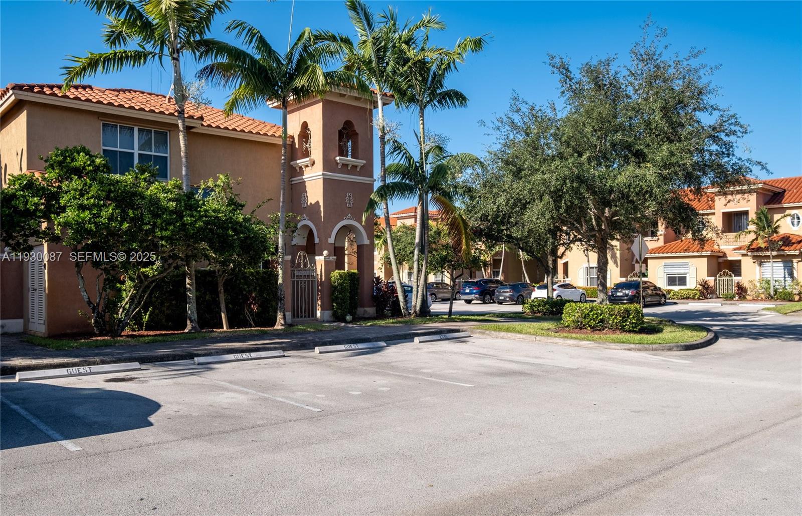1009 Southwest 144th Avenue, Unit 2701 Pembroke Pines, FL 33027 - Photo 32 of 36 a view of street with palm trees
