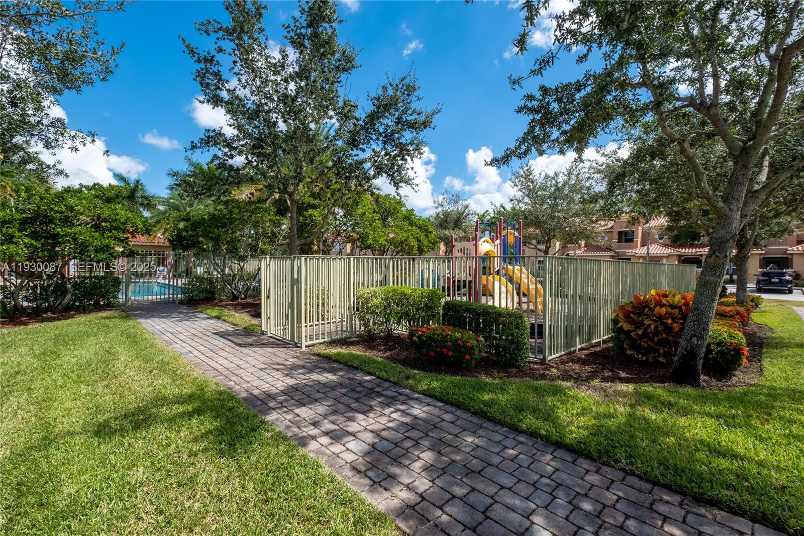 1009 Southwest 144th Avenue, Unit 2701 Pembroke Pines, FL 33027 - Photo 34 of 36 a view of a back yard