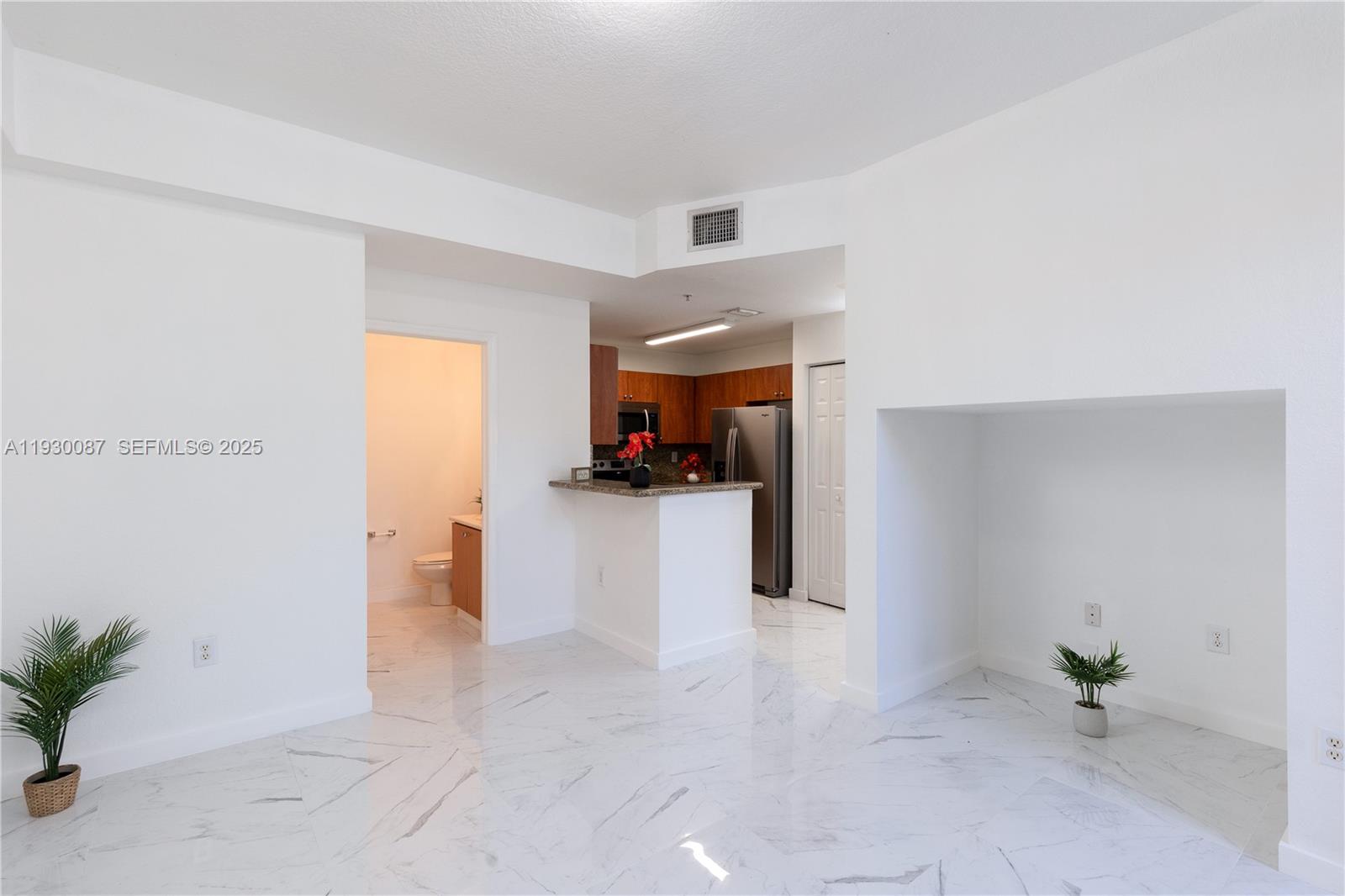 1009 Southwest 144th Avenue, Unit 2701 Pembroke Pines, FL 33027 - Photo 7 of 36 a view of a living room