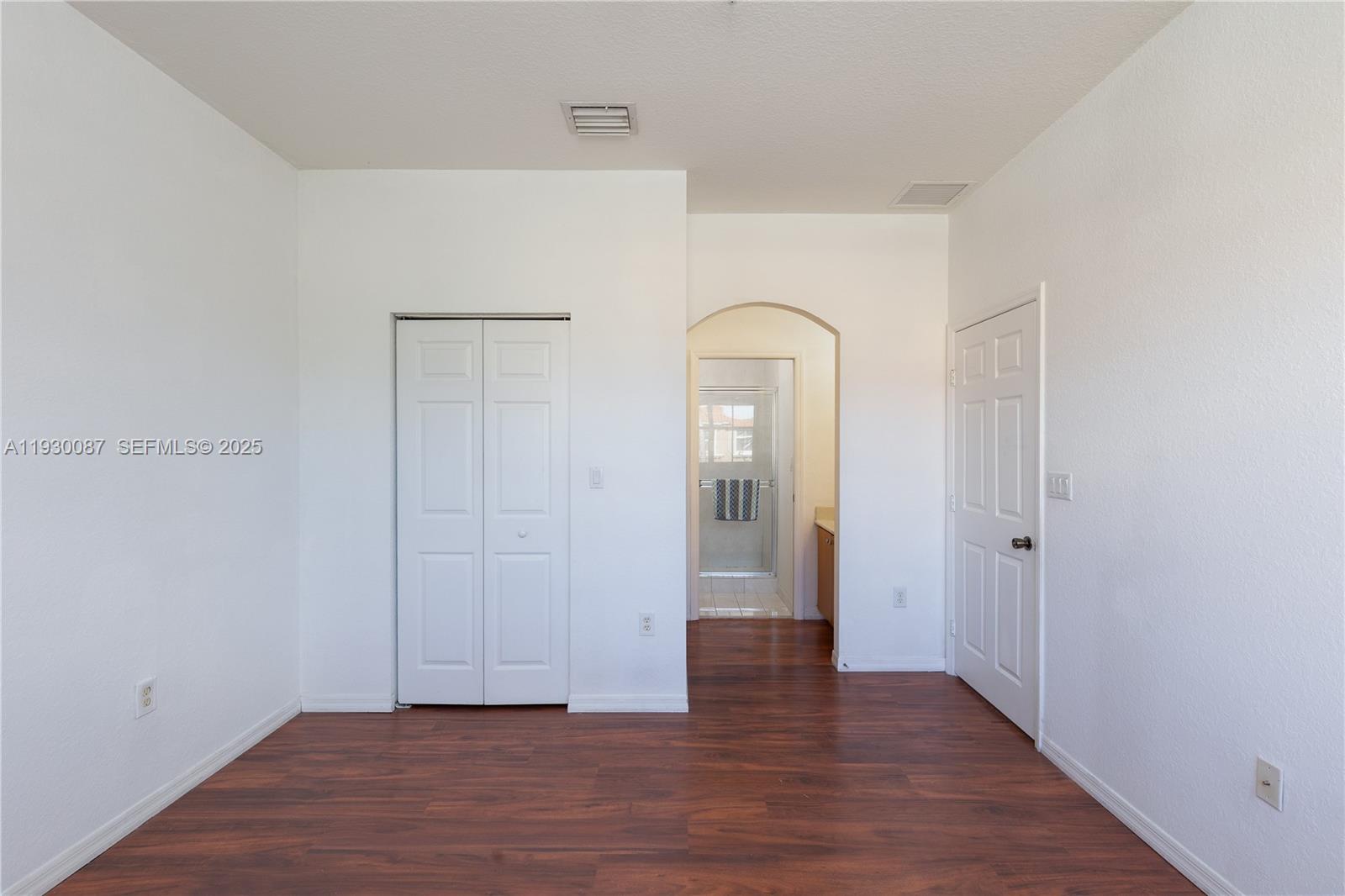 1009 Southwest 144th Avenue, Unit 2701 Pembroke Pines, FL 33027 - Photo 10 of 36 a view of empty room with wooden floor