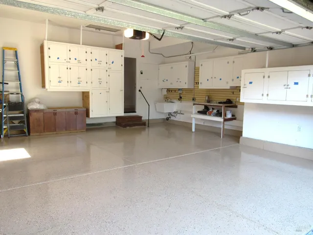 a view of kitchen with furniture and window