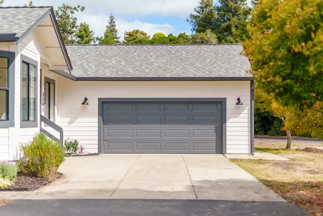 a view of a house with floor to a yard