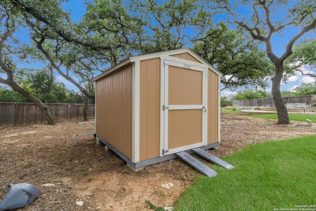 a backyard of a house with seating space