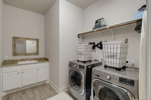 a view of a storage & utility room with washer and dryer