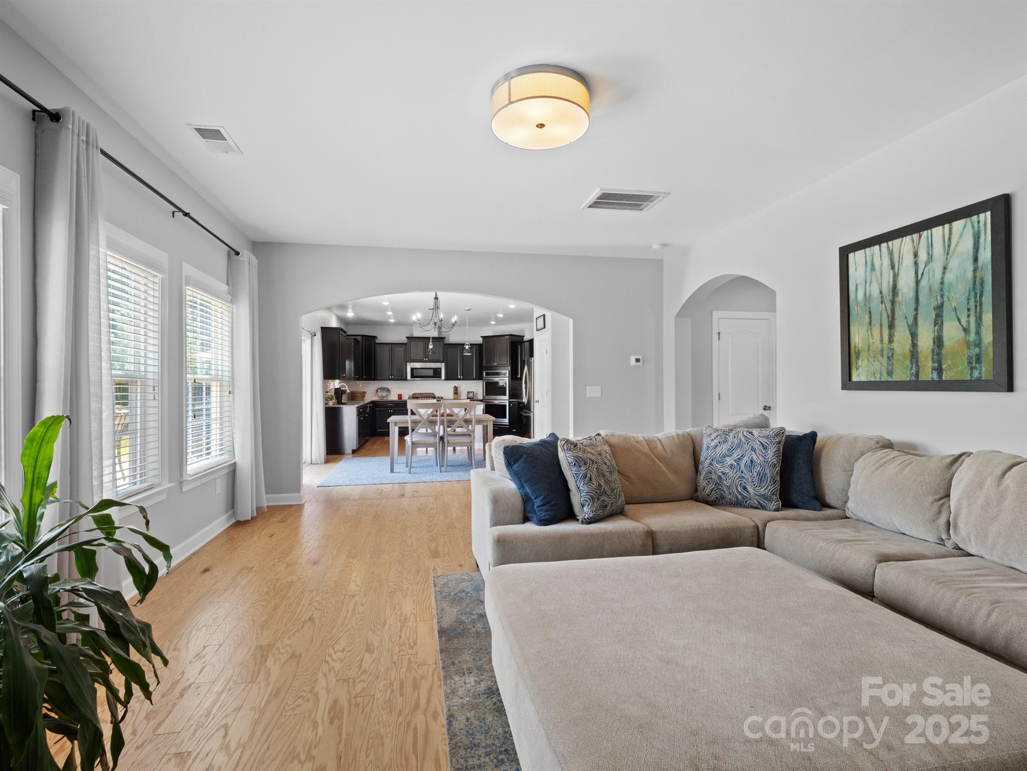 1982 Smokey Quartz Road Davidson, NC 28036 - Photo 18 of 43 a living room with furniture and a large window