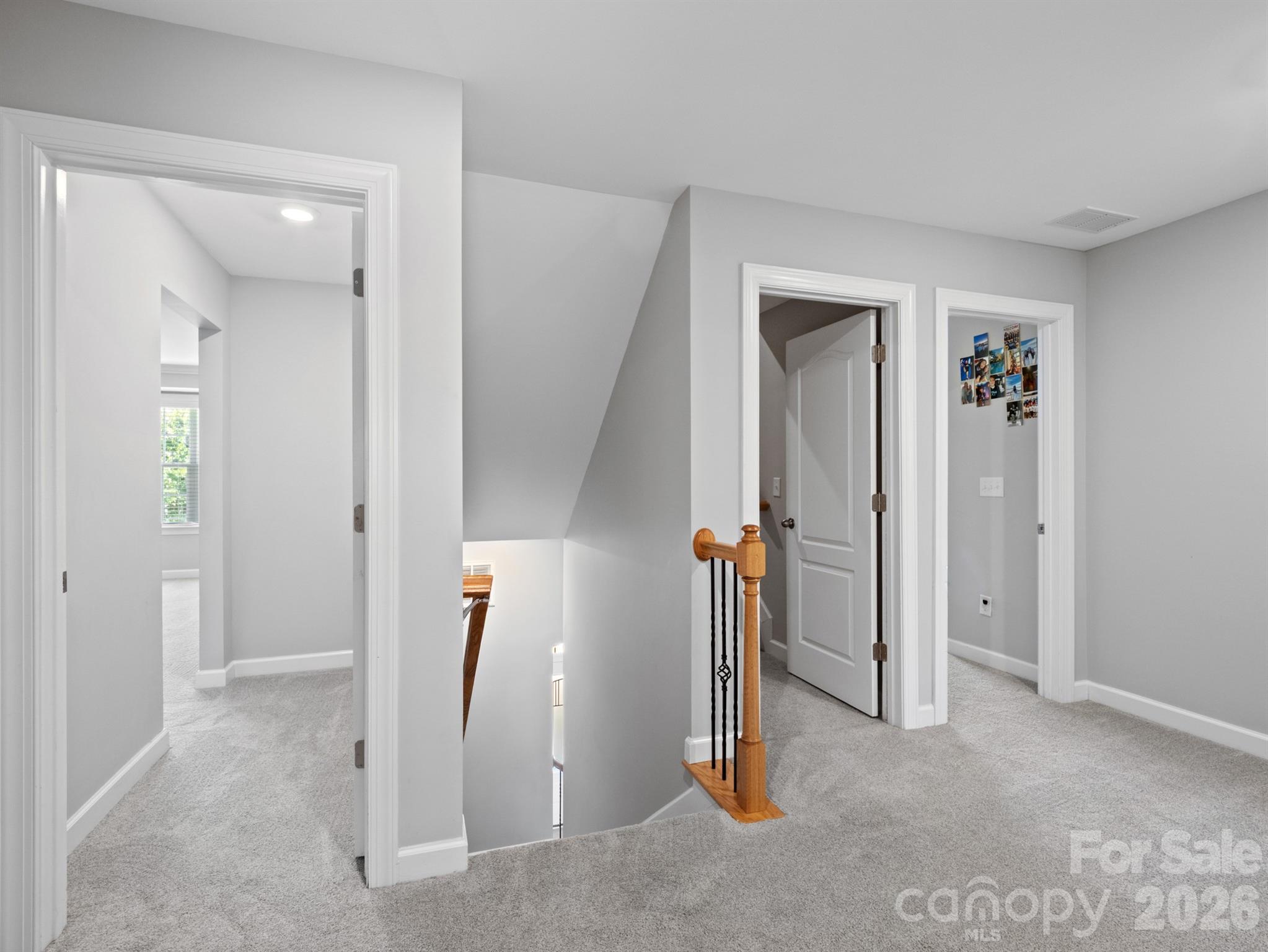 1982 Smokey Quartz Road Davidson, NC 28036 - Photo 19 of 43 wooden floor and chair in a room