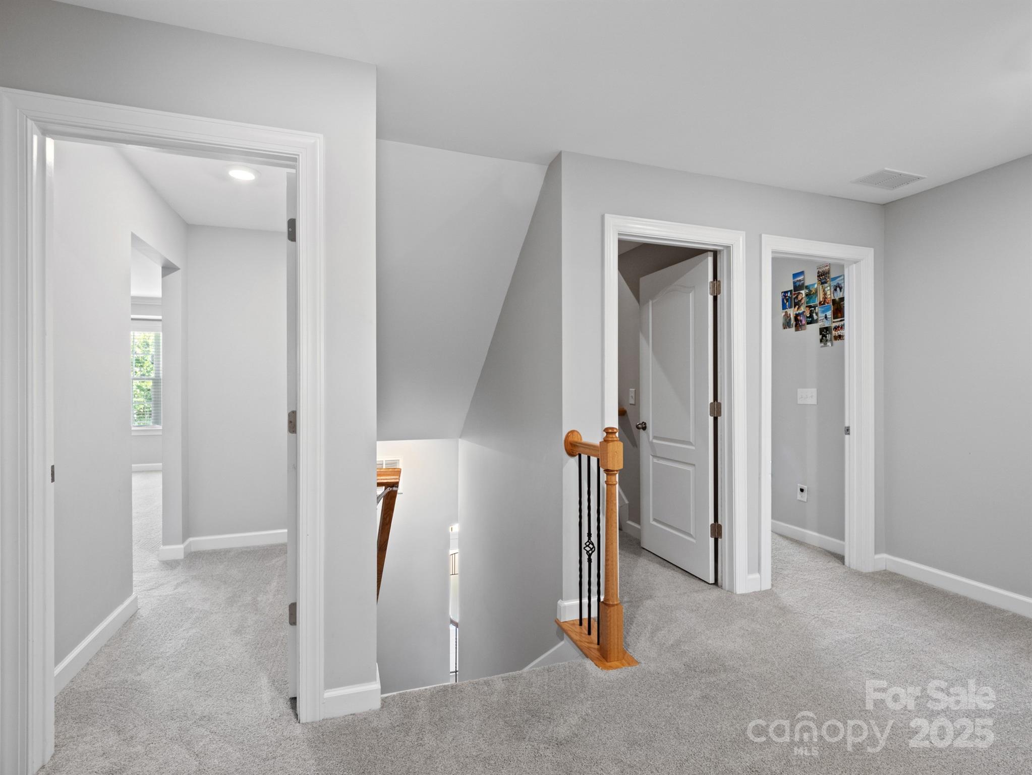 1982 Smokey Quartz Road Davidson, NC 28036 - Photo 19 of 43 wooden floor and chair in a room