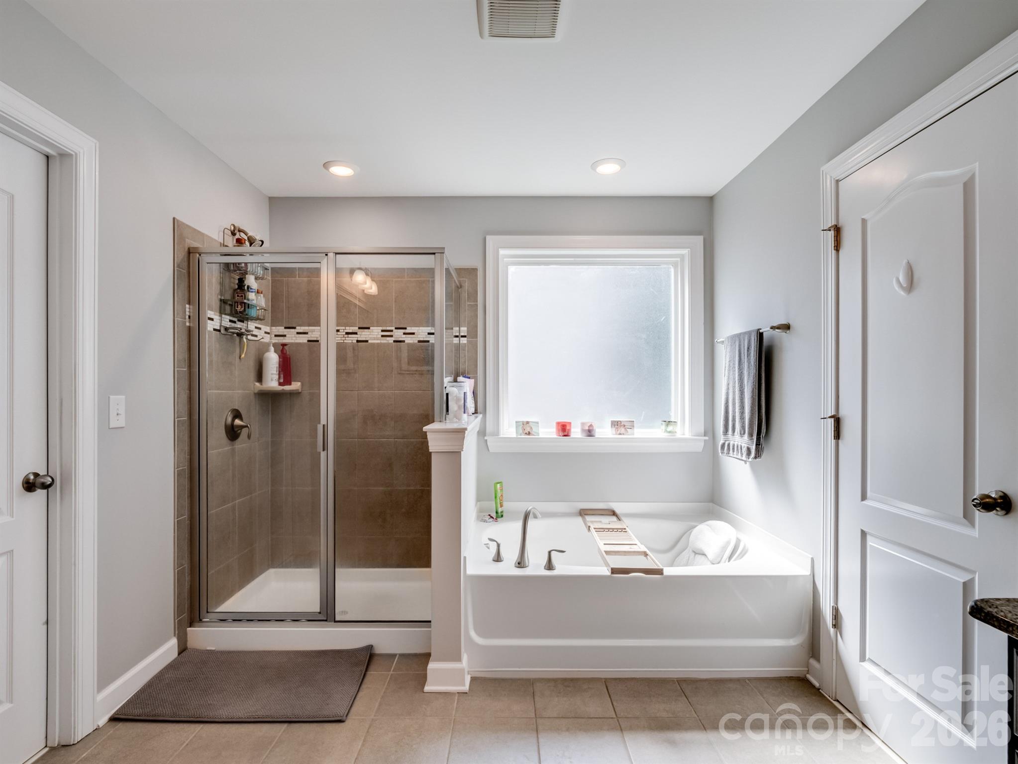 1982 Smokey Quartz Road Davidson, NC 28036 - Photo 25 of 43 a bathroom with a shower