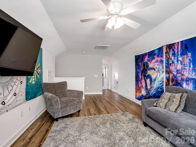 a bed room with a bed and a window