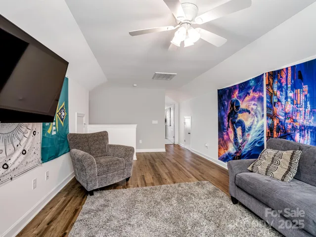 a bed room with a bed and a window