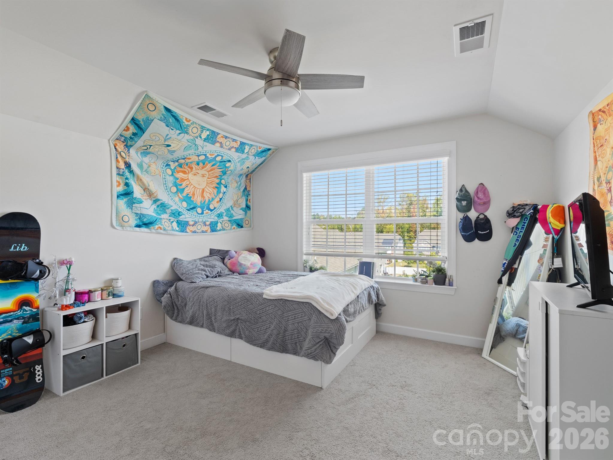 1982 Smokey Quartz Road Davidson, NC 28036 - Photo 36 of 43 a bed room with a bed and a window