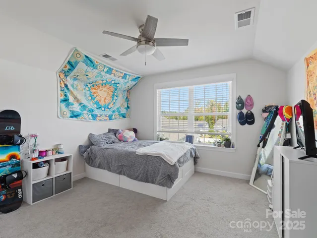 a bathroom with a sink toilet and vanity