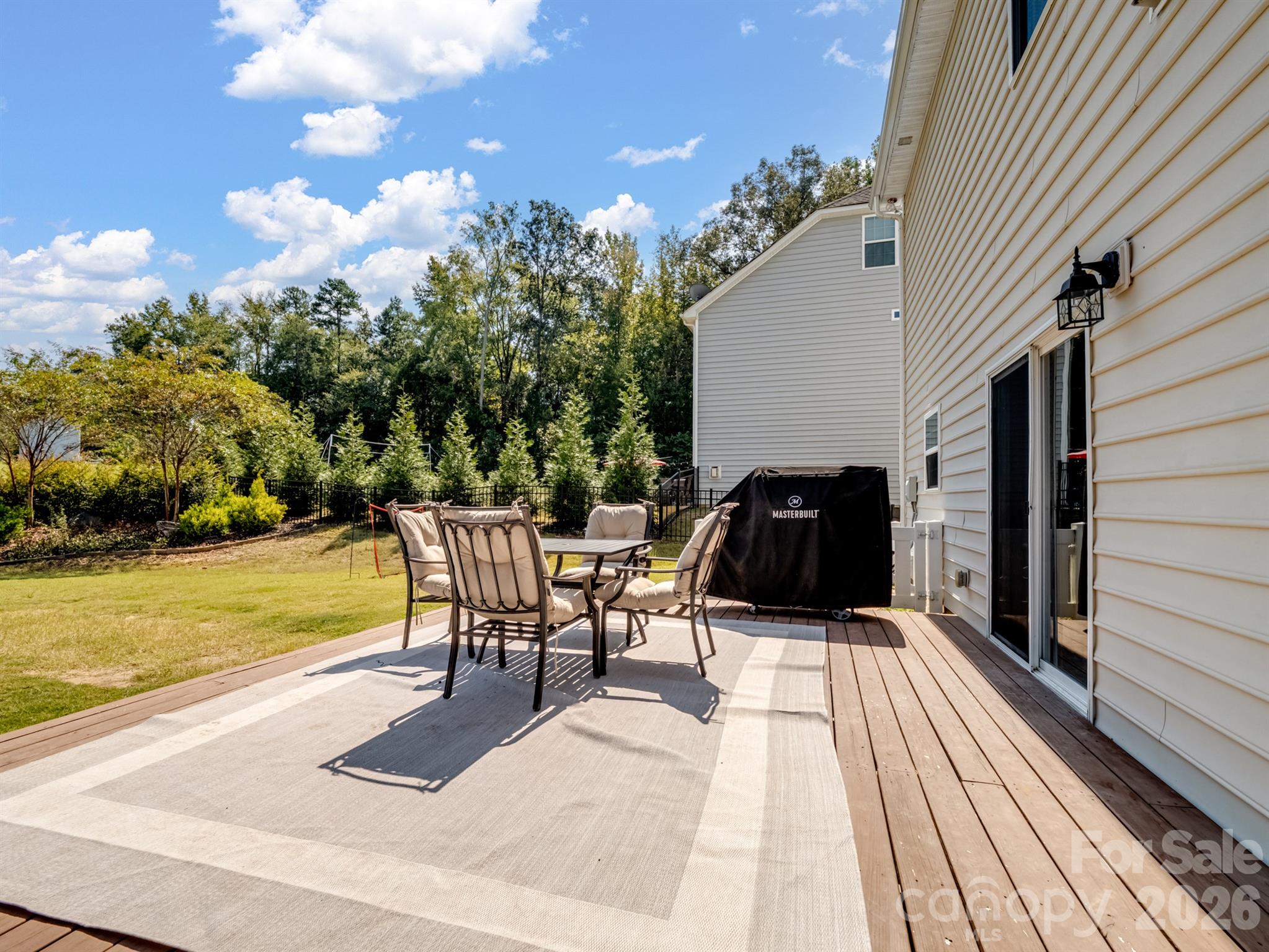 1982 Smokey Quartz Road Davidson, NC 28036 - Photo 39 of 43 a view of a patio with wooden floor
