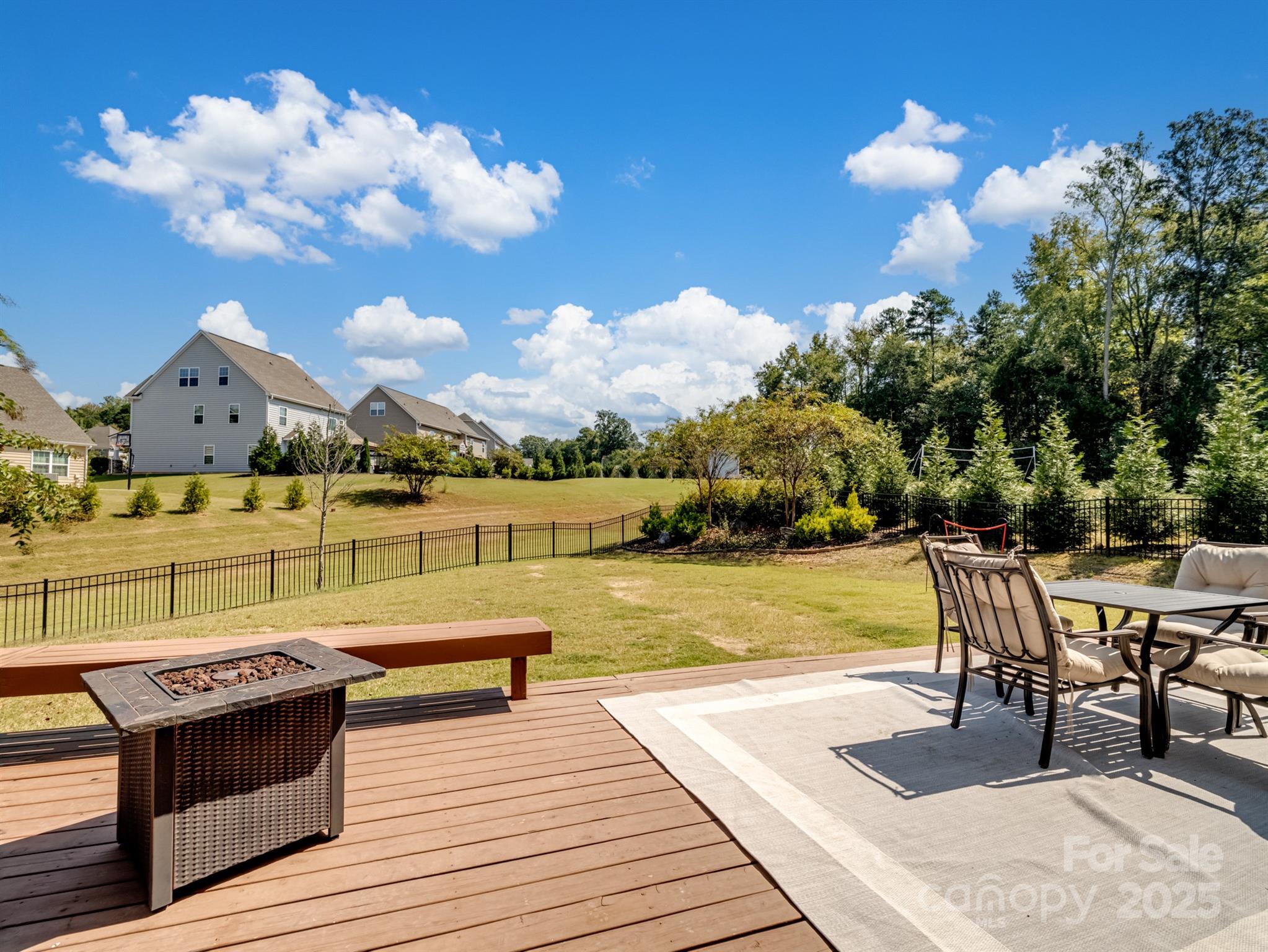 1982 Smokey Quartz Road Davidson, NC 28036 - Photo 40 of 43 a terrace with outdoor seating and city view